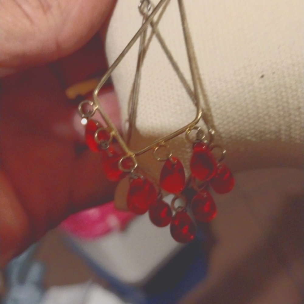 Red and gold tone dangle earrings